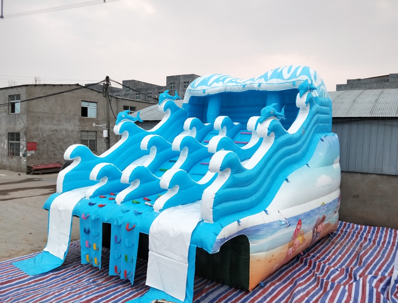 surf-themed inflatable water slide